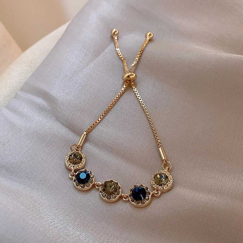 Verstellbares rundes Kristallarmband in Gold