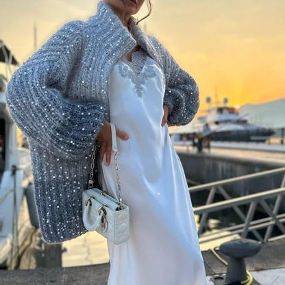 Pullover aus einfarbigem Strick mit Pailletten