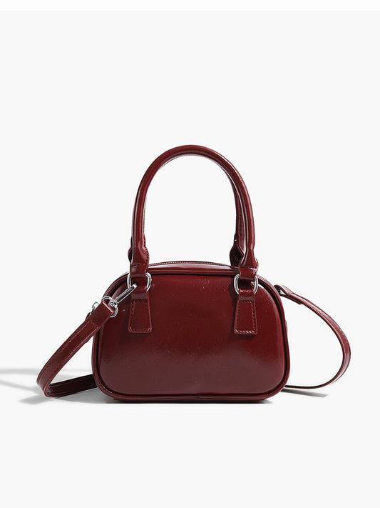 Vielseitige Crossbody- und Top-Handle-Tasche