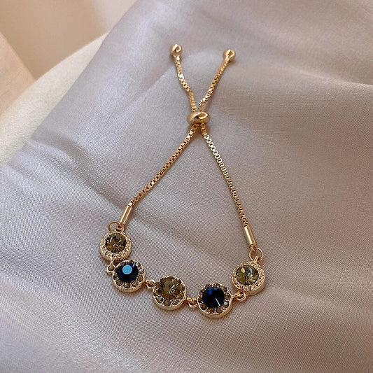 Verstellbares rundes Kristallarmband in Gold