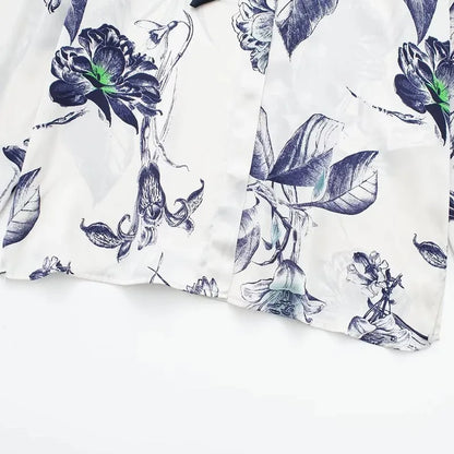 Mira | Elegante Damenbluse mit Schleifenmuster