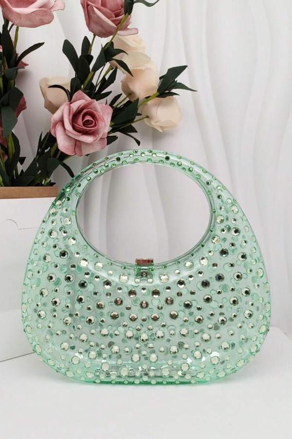 Clutch aus Acryl mit Strassverzierung